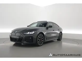 BMW i4 eDrive40 M Sport Pro 84 kWh | S/K-Dak | Elek. Trekhaak | Shadowline | Widescreen | Adapt. Cru