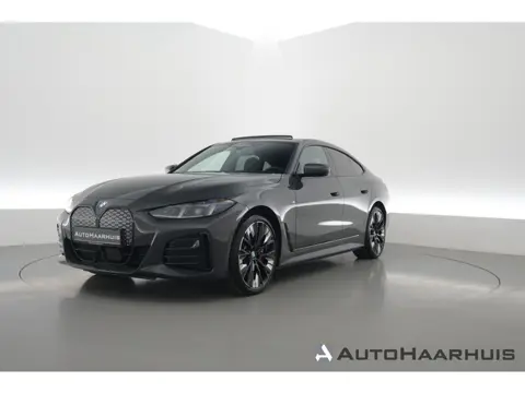 BMW i4 eDrive40 M Sport Pro 84 kWh | S/K-Dak | Elek. Trekhaak | Shadowline | Widescreen | Innovation