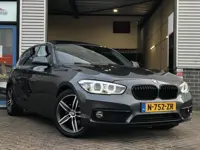 BMW 1-serie 118i High Executive|Automaat|Schuifdak|Carplay|Leer|Airco|Cruise|Navi|PDC|Stoelverwarmin