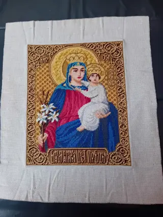 Schitteren borduurwerk van Russische icoon