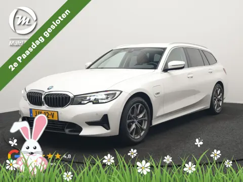BMW 3 Serie Touring 320e Sportline PHEV 204pk Dealer O.H | Lederen Sportstoelen Verwarmd | Sfeerverl