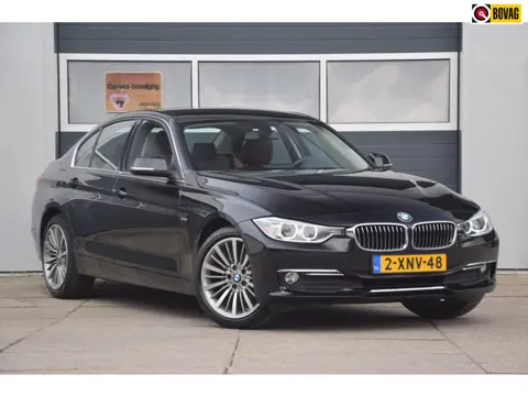 BMW 3-serie 316i Luxury High Executive LEDEREN BEKLEDING/BI-XENON/STOELVERWARMING