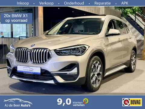 BMW X1 xDrive25e High Executive Kaschmirsilber | Beige leder | Camera | HUD | Stoelverwarming | 4x4