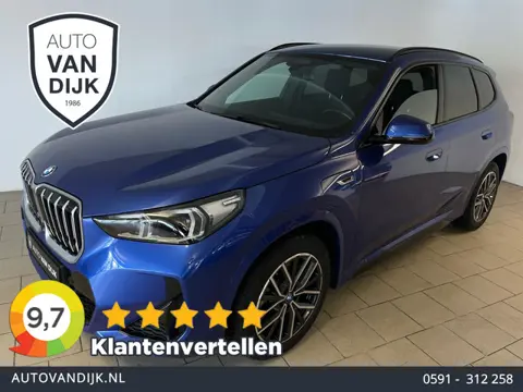 BMW X1 XDrive30e M Pakket 327PK AUTOMAAT AIRCO NAVI CRUISE BT STUURVERWARMING 360 CAMERA LED MET LAK