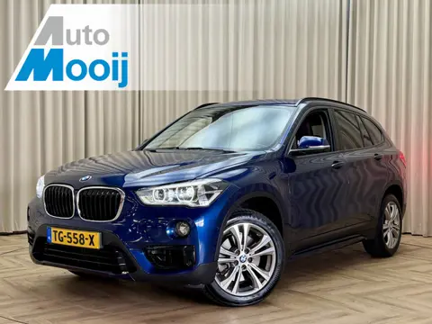 BMW X1 sDrive20i 192 PK Org.NL! / HUD / Navi Pro / Keyless / Afn. Trekhaak / Camera / Leder / Stoelv