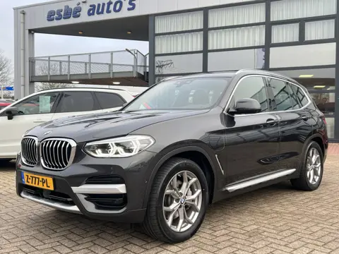 BMW X3 xDrive30e X-Line Panoramadak Trekhaak ACC Driving Assist Plus Elek stoelen Navigatie Live Coc