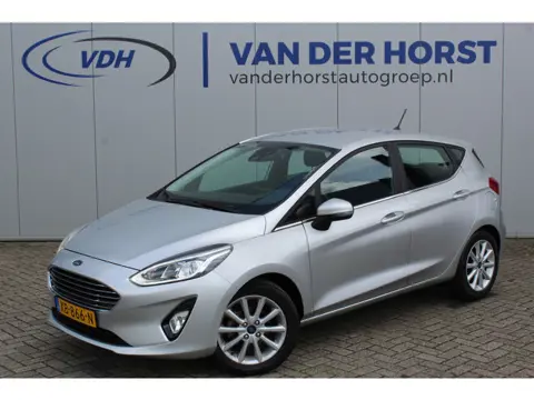 Ford Fiesta 1.0-100pk EcoBoost Titanium 5drs. Uiterst nette, luxe en zuinige Ford Fiesta. Voalautm. 