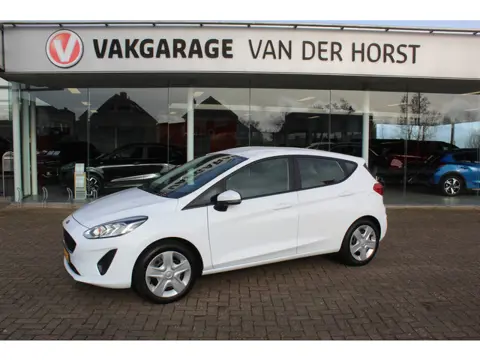 Ford Fiesta 1.1-71pk Trend 5drs. Erg nette Ford Fiesta voor nog jaren rijplezier ! Airco, parkeersen
