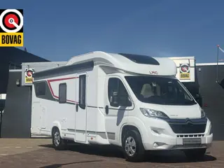 LMC 730 Tourer lift 165 PK enkele bedden+hefbed dakairco hordeur grote garage fietsenrek grote garag