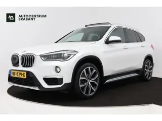 BMW X1 SDrive20i Centennial High Executive (PANORAMADAK, TREKHAAK, STOELVERWARMING, HEAD-UP DISPLAY,