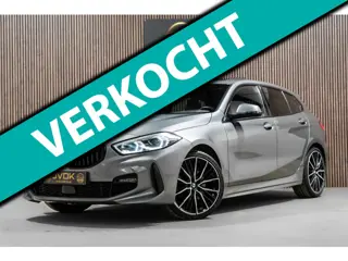 BMW 1-serie 118i M-Sport Pano HUD HK Muziek Kuipstoelen BTW