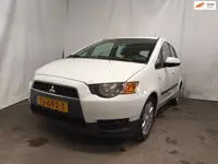 Mitsubishi Colt 1.1 Edition One - Rechter Zijschade