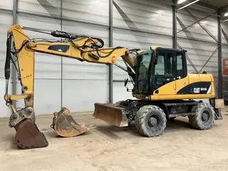 Cat M 313 D (bj 2009)