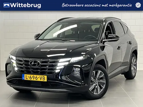 Hyundai Tucson 1.6 T-GDI HEV Comfort NAVIGATIE | STOELVERWARMING | ZUINIGE HYBRIDE | DEALER ONDERHOU