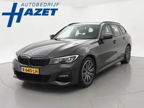 BMW 3-serie Touring 318i AUT. M-SPORT DRAVITGRAU + SPORTSTOELEN | CAMERA | MEMORY | HIFI | SFEERVERL