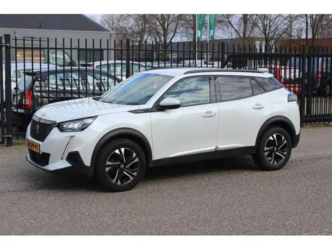 Peugeot 2008 1.2 PureTech Allure, Lesauto met dubbele bediening