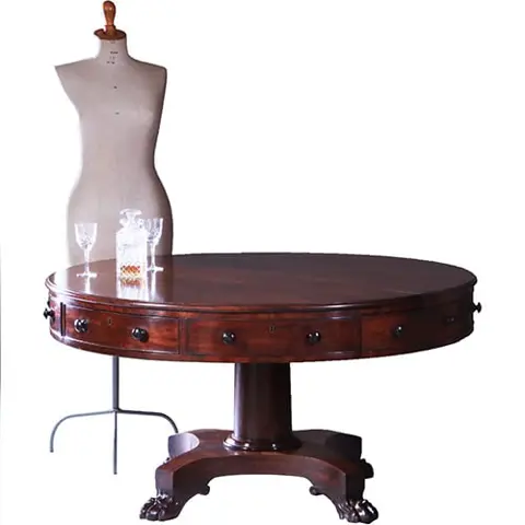 Drumtabel met massief mahonie blad 4 laden en 4 schijnladen ca 1815