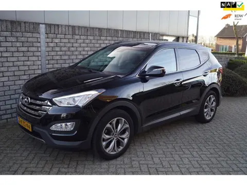 Hyundai Santa Fe 2.4i GDI 4WD i-Catcher Autom Panodak Leder Stoel/Abank Verw Navi Camera Xenon Clima