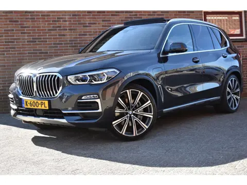 BMW X5 XDrive45e High Executive '21 SOH 87,7% Laserlight Pano Individual Pano Leder Clima Navi Cruis