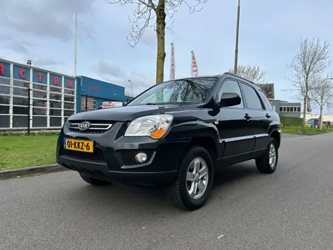 Kia Sportage 2.0 CVVT X-ecutive LEES TEKST