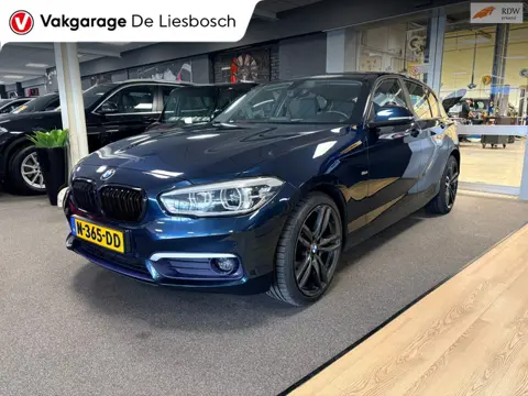 BMW 1-serie 118i Centennial High Executive,urban.led,stoelverw,cilima,cruisec,pdc