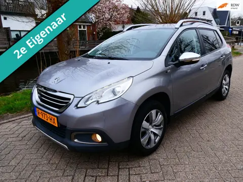 Peugeot 2008 1.2i Active 132.000km. 2e eig. Clima Cruise Navi Trekhaak 1100kg.
