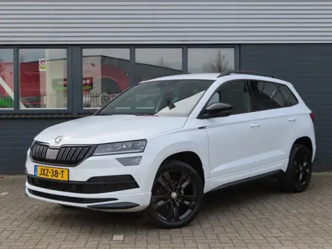Škoda Karoq 1.5 TSI ACT Sportline Business DSG | verwarmbare voorruit | voorstoelen + achterbank ver