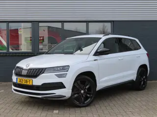 Škoda Karoq 1.5 TSI ACT Sportline Business DSG | verwarmbare voorruit | voorstoelen + achterbank ver
