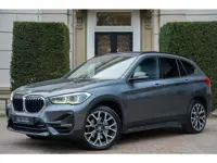 BMW X1 sDrive20i High Executive TREKHAAK | PANO | CAMERA | HUD | 19 INCH | 1E EIGN