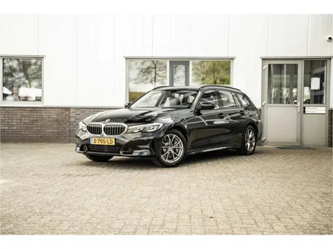 BMW 3 Serie Touring 330e High Executive (bj 2020)