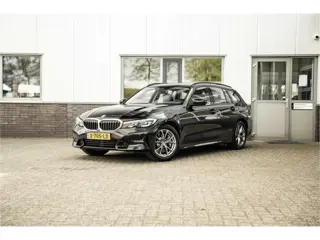 BMW 3 Serie Touring 330e High Executive (bj 2020)