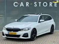 BMW 3-serie Touring 330e M-SPORT PANO TREKHAAK Harman Kardon