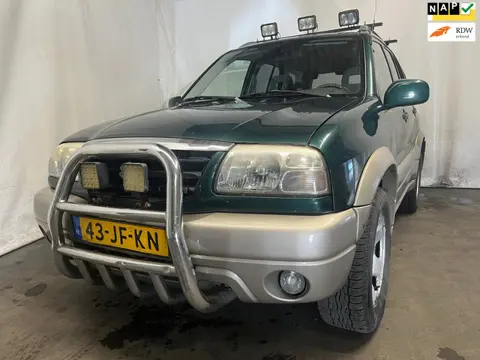 Suzuki Grand Vitara 2.0 - Rondom Gebruikersschade