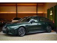 BMW I4 EDrive40 High Executive 84 kWh - M-Sport - Stuurverwarming - Harman Kardon - Adaptive Cruise 