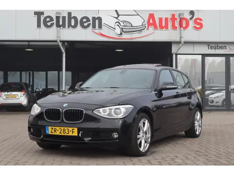 BMW 1-serie 118i Executive | Schuif-/kanteldak | Xenon | Parkeersensoren | Climate control