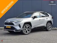 Toyota RAV4 2.5 Plug-in Hybrid AWD Bi-Tone Plus | Schuif/kantel dak | JBL | BSM | Stoel verw+ventila