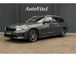 BMW 3 Serie Touring 330e xDrive | Sportleder | Head-Up | Laserlicht | Comfort Access | Memory