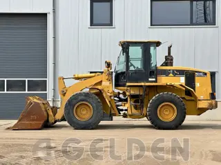 Caterpillar 938G II - Quickcoupler + Forks (bj 2004)