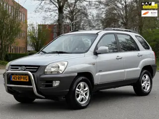 Kia Sportage 2.0 CVVT Adventure 4WD|NAVI|CARPLAY|CRUISE|HALFLEDER|AIRCO|TREKHAAK|