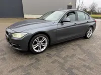 BMW 3-serie 316i High Executive Sport Navi Leer