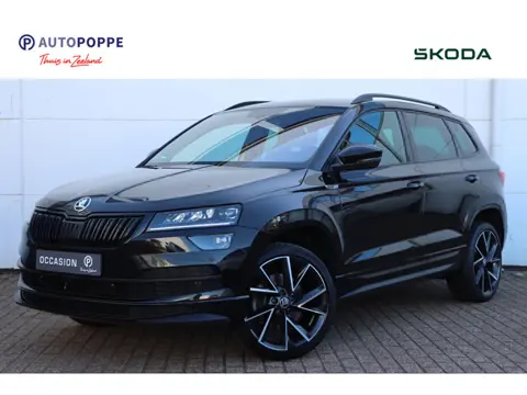 Skoda Karoq 1.5 TSI 150pk DSG7 Sportline Business | Trekhaak | Camera | Carplay