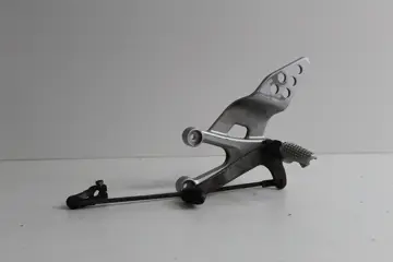 Main step holder left Yamaha YZF R 125 2008 - 2014