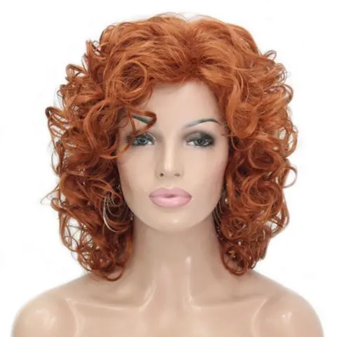 PRUIK SCHOUDERLANG KRULLEND HAAR model 9948