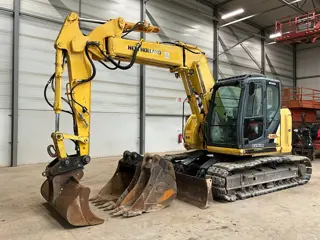 New Holland E 140 C SR (bj 2013)