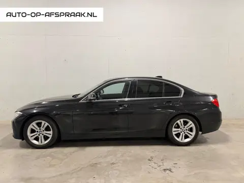 BMW 3-serie 320i High Executive Navi Automaat Cruise Clima Stoelverw.