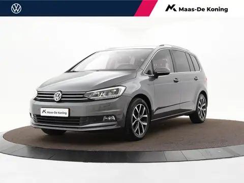 Volkswagen Touran 1.4 TSI 150pk DSG Highline 7p · Camera · Wegklapbare Trekhaak · Apple/Android Car 