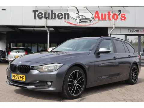 BMW 3-serie Touring 318d | MASSAVLIEGWIEL HOORBAAR | Trekhaak afneembaar | Navigatie | Bluetooth | E