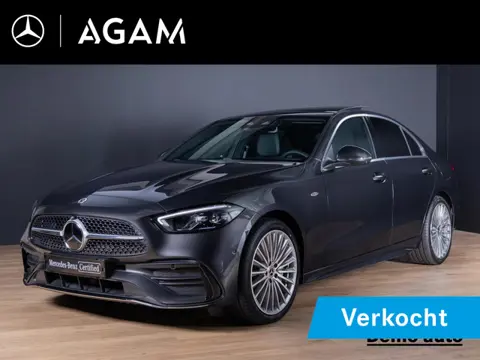 Mercedes-Benz C-Klasse Limousine 300 e Business Solution AMG Panorama dak | Trekhaak