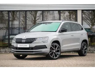 Škoda Karoq 1.5 TSI ACT Sportline Business | Trekhaak | Adapt. Cruise | Camera | 19" | Winterpakket