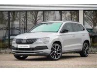 Škoda Karoq 1.5 TSI ACT Sportline Business | Trekhaak | Adapt. Cruise | Camera | 19" | Winterpakket